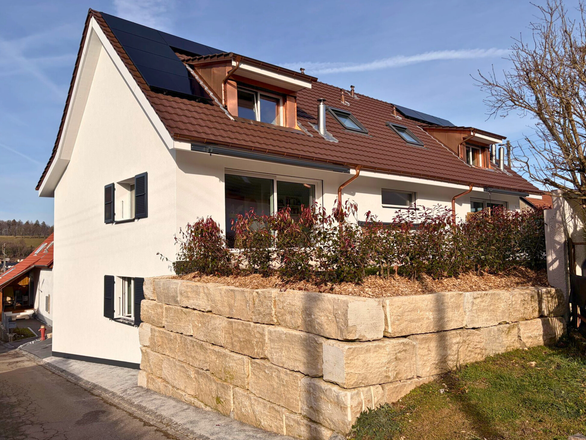 Transformation d’une maison villageoise en immeuble de 4 appartements